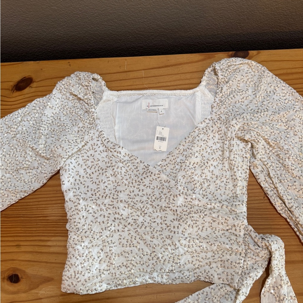 NWT-Anthropology White & Gold Sequence Wrap Top
